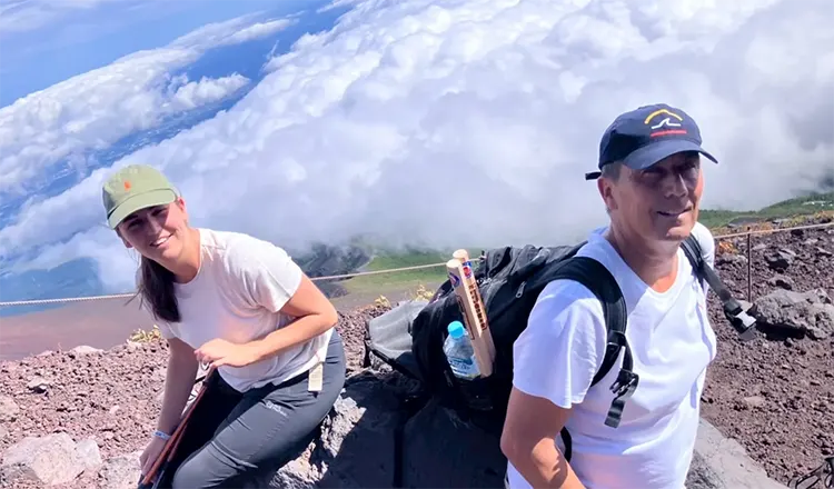 Taking a break while climbing Mt. Fuji